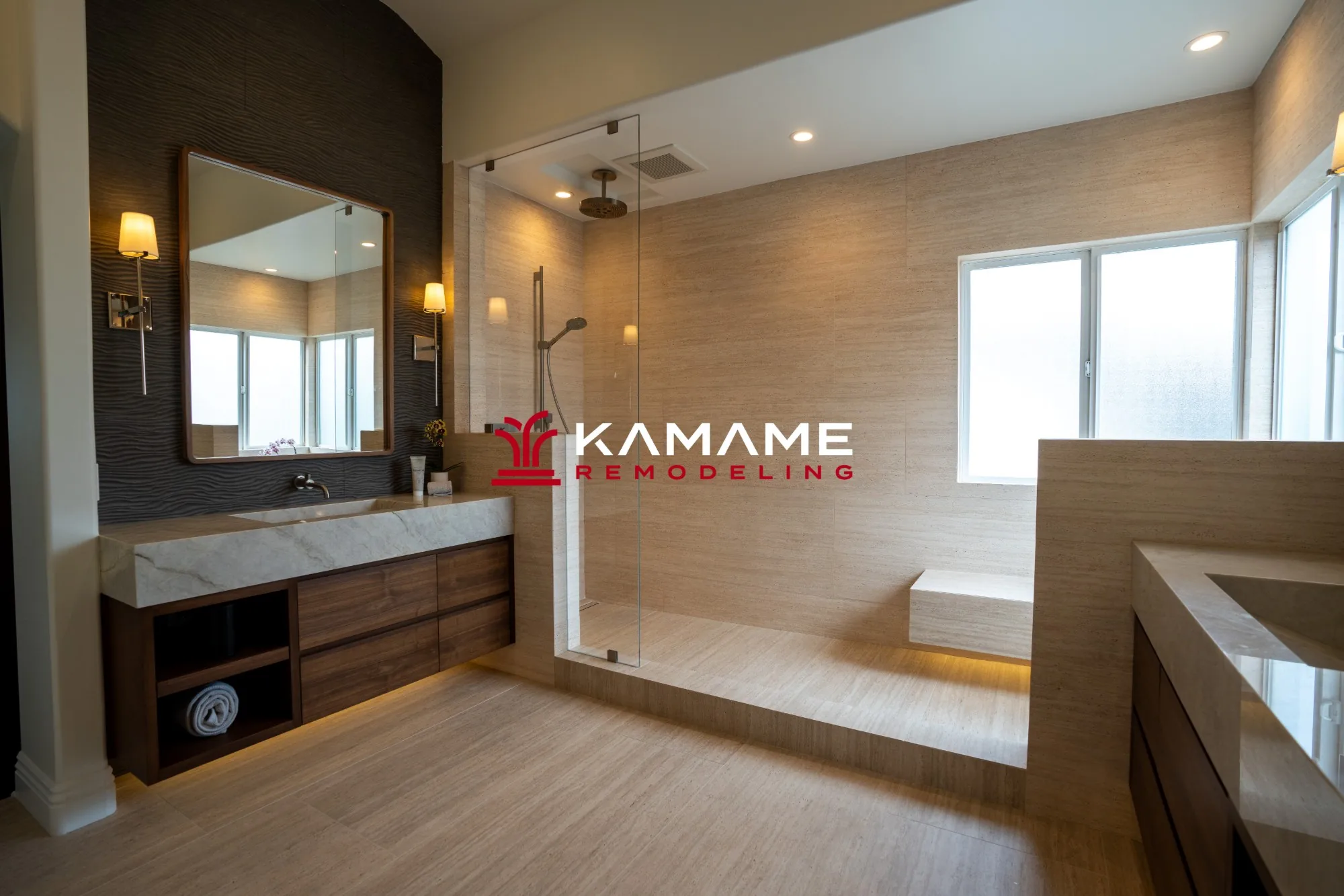 Bathroom remodel with a floating walnut vanity, stone counter, and a glass walk-in shower